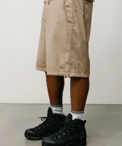 SURPLUS SHORT
